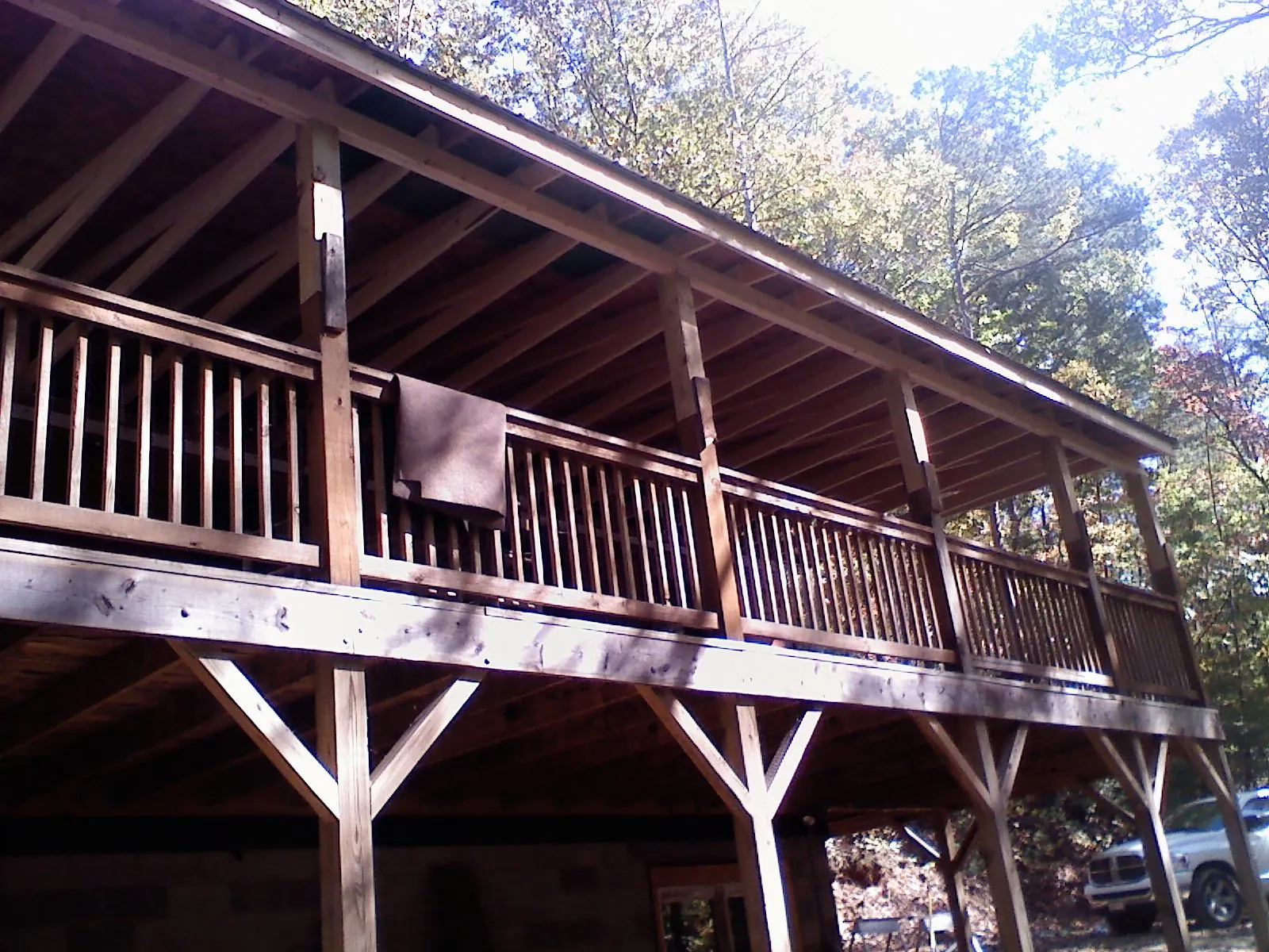 Timber framing under a new elevated porch and deck — Roof Leak Repair in Lindenhurst by Roofing Brothers